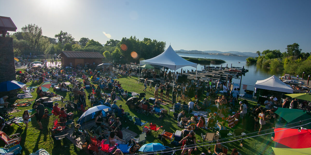 Photo of live music performance at the Summer Music Series at Konocti Vista Casino on the hotel marina lawn.